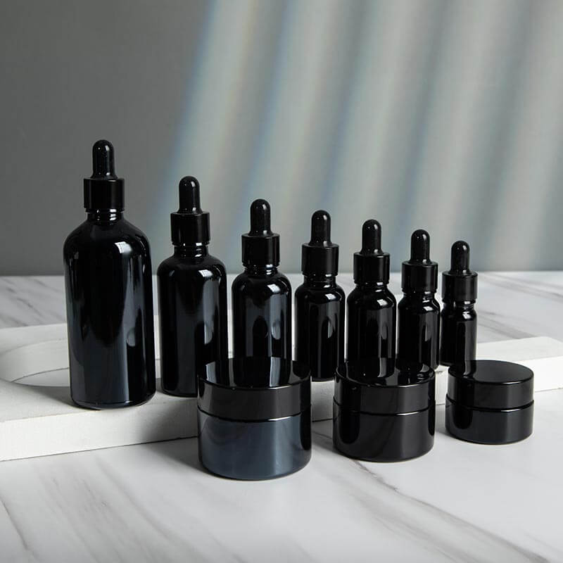 black essential oil bottles
