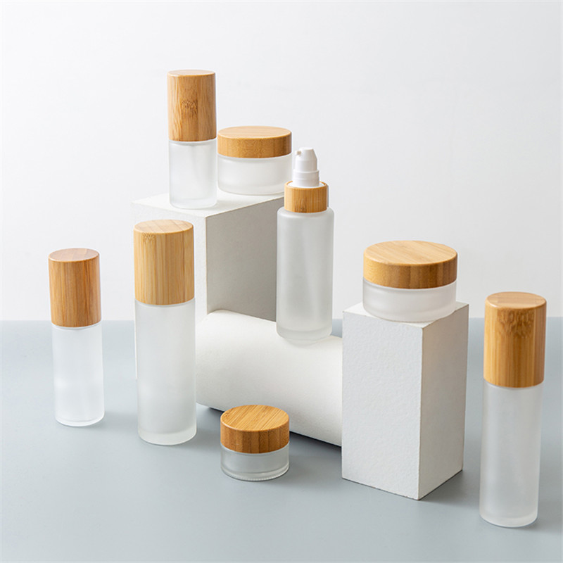 Cosmetic Glass Containers Cream Jar Lotion Bottle With Bamboo Lid - Xuzhou OLU Daily Products Co., Ltd. Featured Image