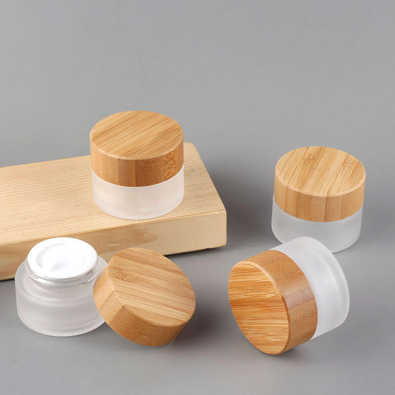 Frosted Small 5g 10g 15g Lippie Eye Cream Glass Jars with Bamboo Lid - Xuzhou OLU Daily Products Co., Ltd.