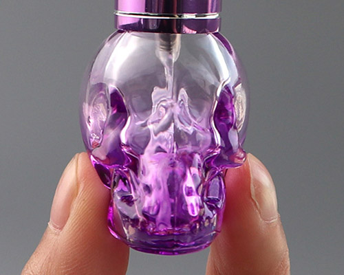 skull glass perfume bottle