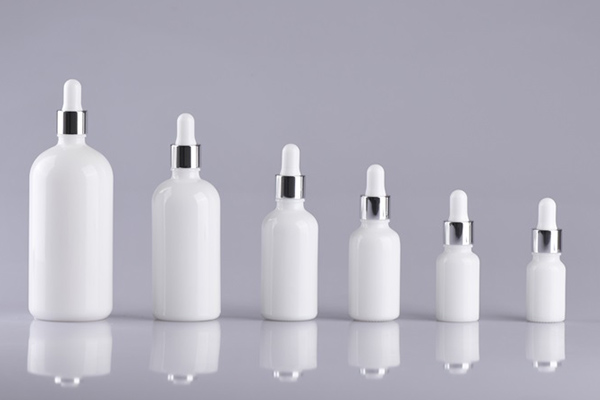 white porcelain dropper bottle